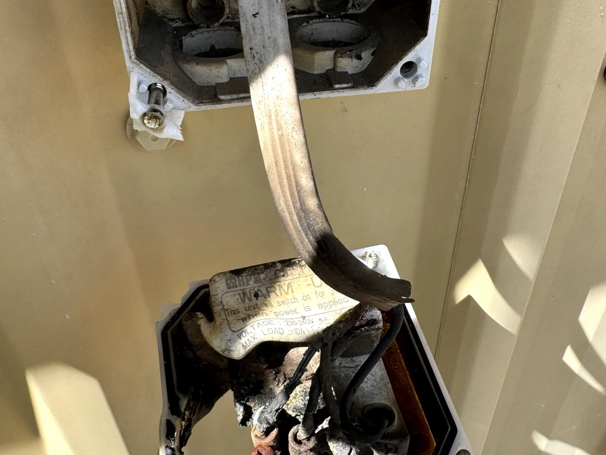 Heat-damaged electrical connection found during fault finding