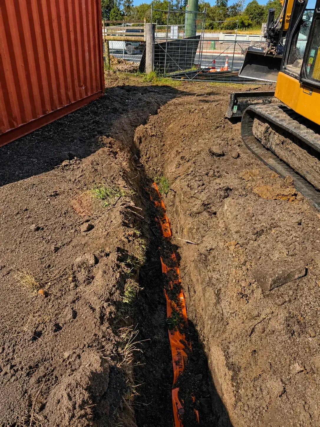 Excavated trench for underground electrical infrastructure